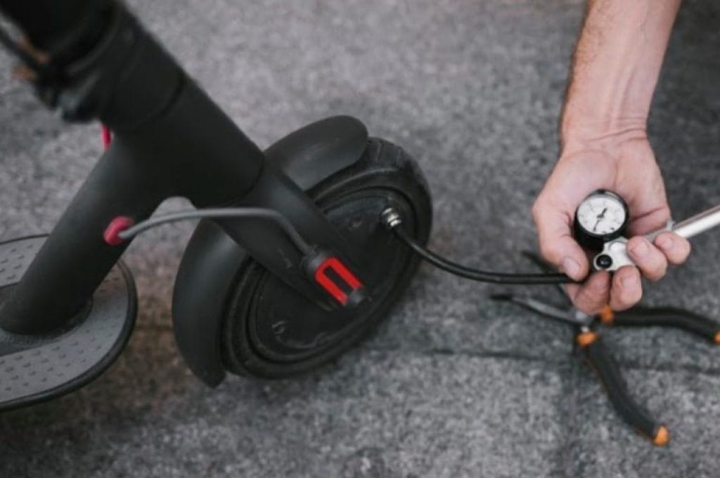 a person using a pressure gauge